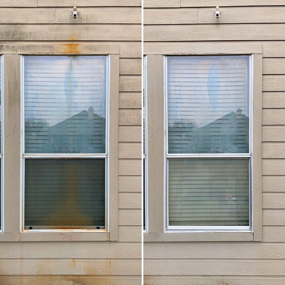 Dirty windows and stained house siding before professional window cleaning and pressure washing service in Orange County